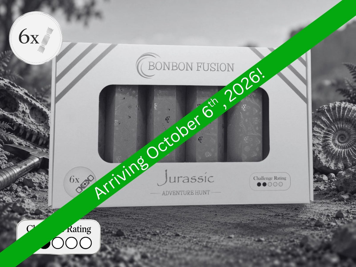 Bonbon Fusion Jurassic Adventure Hunt pack of six Christmas bonbons surrounded by fossils and a dinosaur skull, with a green banner reading “Arriving October 6th, 2026!”