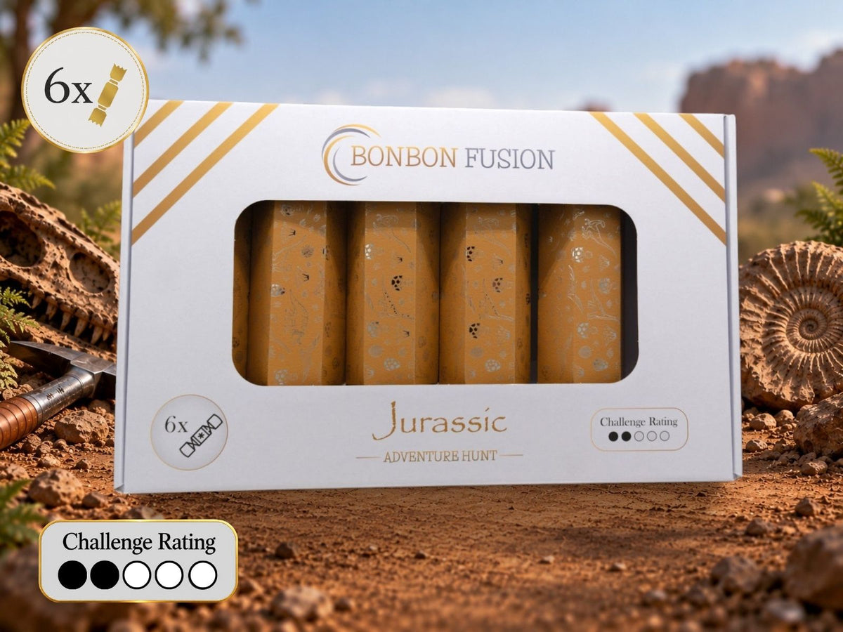 Bonbon Fusion Jurassic Adventure Hunt pack of six golden Christmas bonbons on rocky ground beside a dinosaur skull, ammonite fossil and excavation tool, with a challenge rating of two out of five.